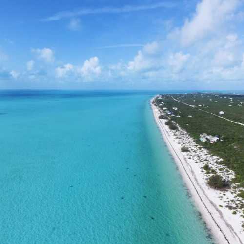 Long Bay Beach: 3 miles of soft, white sand and blue shallow waters