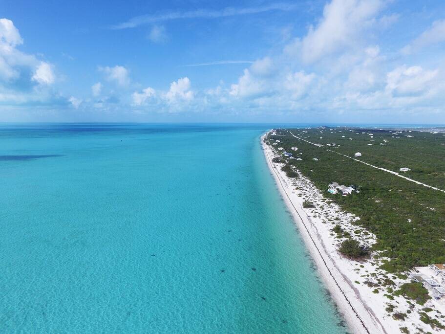 3 miles of soft, white sand and blue shallow waters