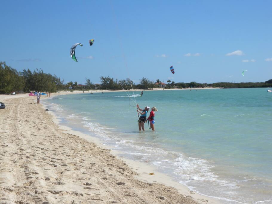 Take kiteboarding lessons (5 min. away)