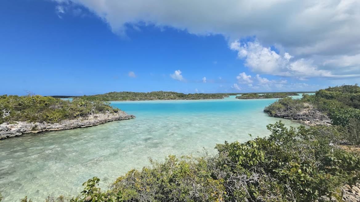 Bright turquoise lagoon and rock islets at Chalk Sound National Park
