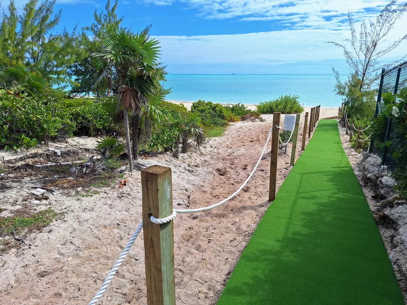 Private path from the villas to Long Bay Beach